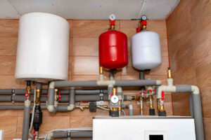 heat pump water heater vs tankless